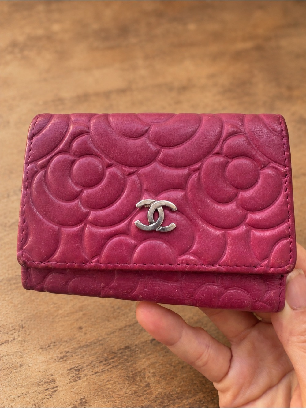 CHANEL Fuchsia Camellia-Embossed Leather Trifold Key Wallet with Silver CC